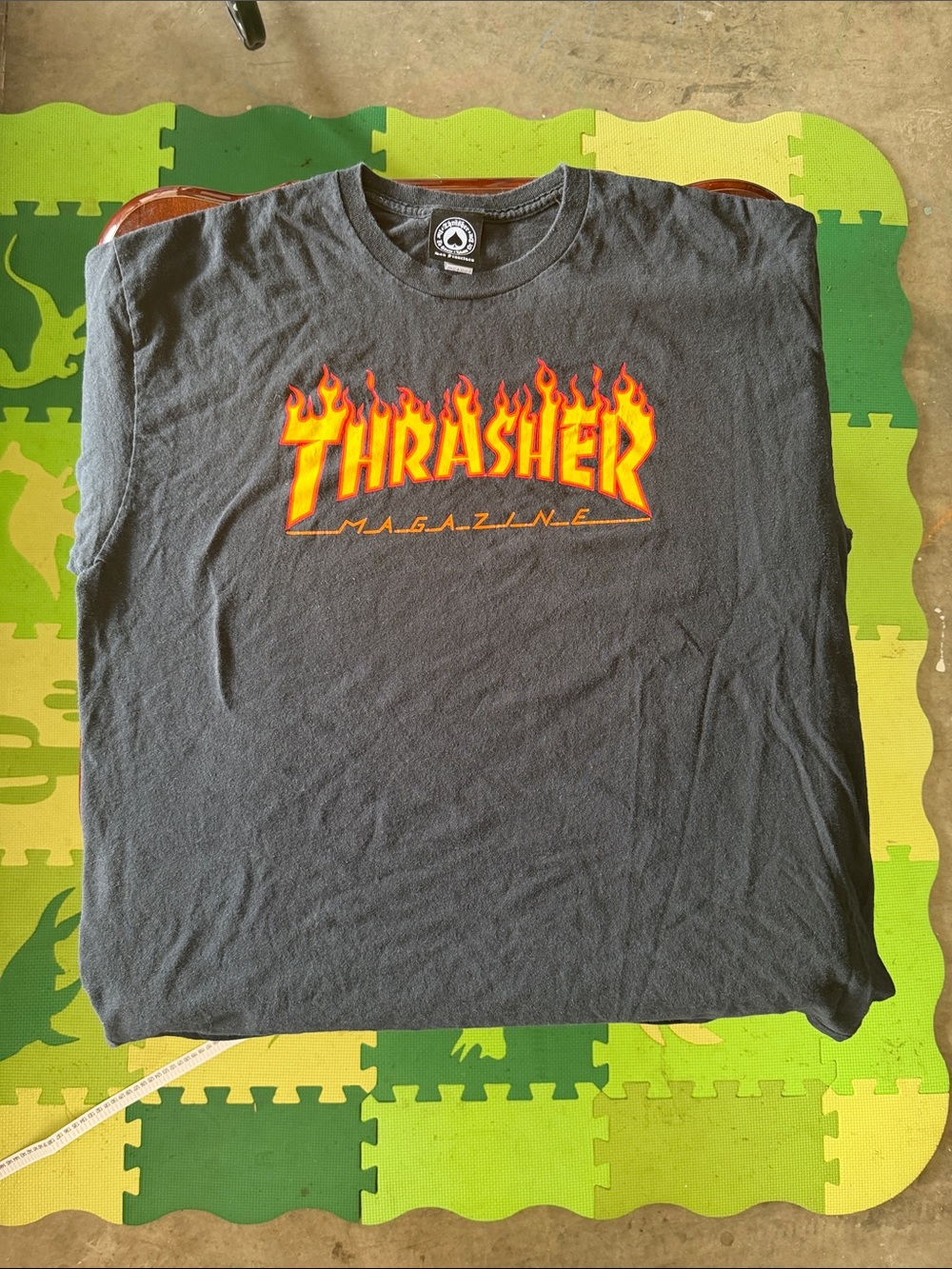 Thrasher Black Tee with Yellow-Orange Flame Logo
